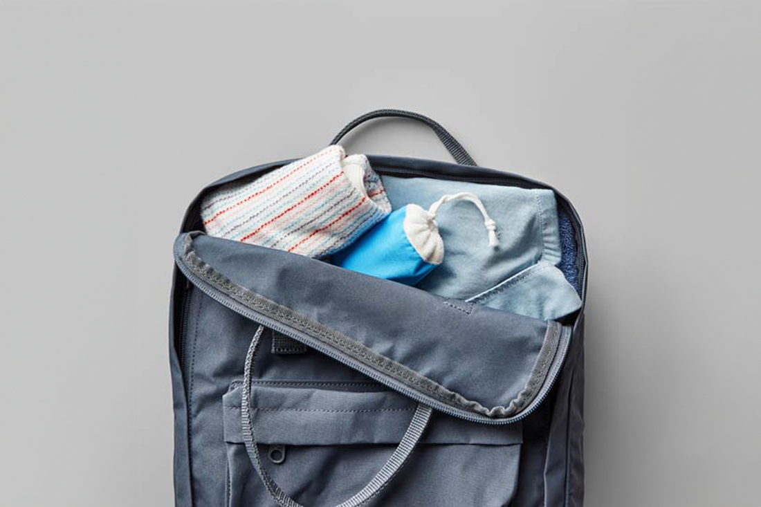 An image of an opened bag with two pouches shown inside.