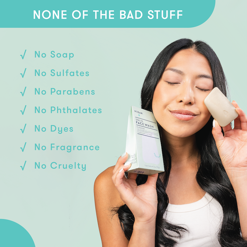 Woman holding skincare products with a list of bad things that are not in HiBAR. No soap, no sulfates, no parabens, no phthalates, no dyes, no fragrance, no cruelty.