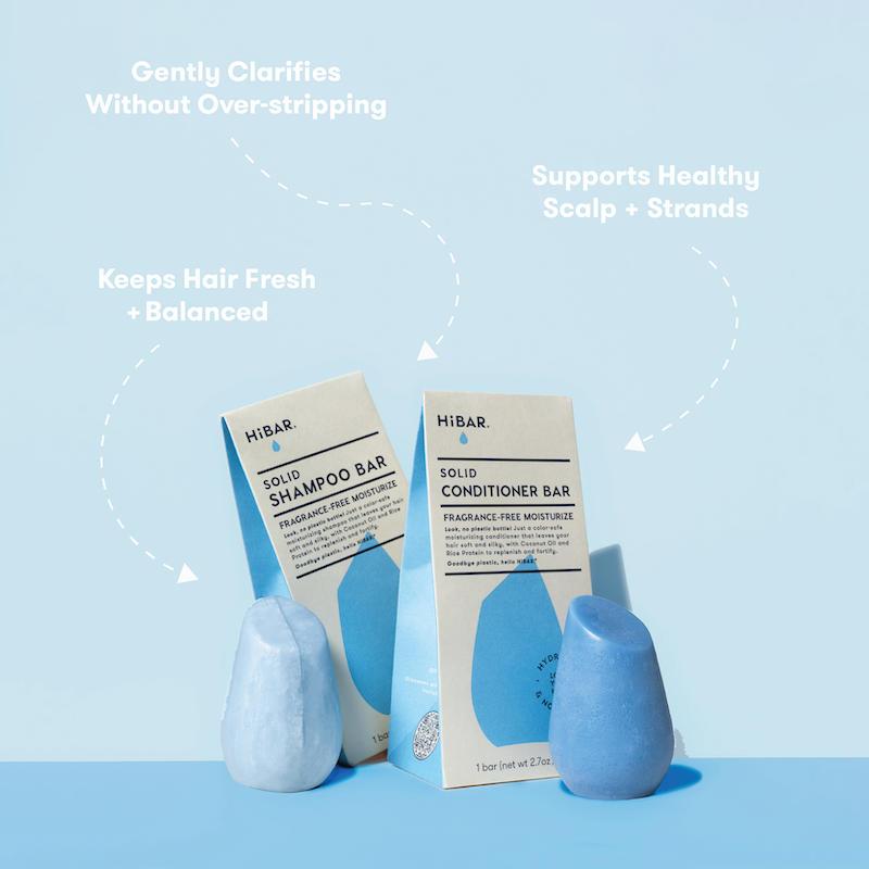 HIBAR solid shampoo and conditioner bars on a light blue background with text about product benefits. Detangles + tames frizz. Restores Natural Resilience. Nourishing Moisture without buildup. 