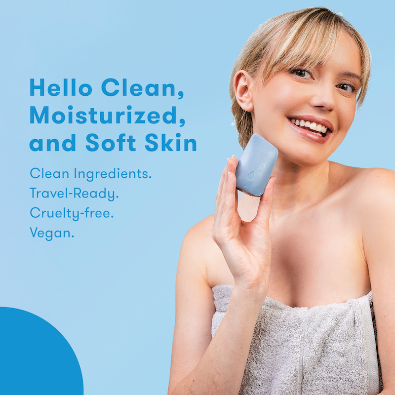 Woman holding face wash bar with text about skincare products on a light blue background. Hello clean, moisturized, and soft skin. Clean ingredients. Travel-ready. Cruelty-free. Vegan.