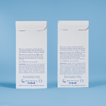 Photo of the back of the packaging of the shampoo bar and conditioner bar set.