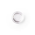 lactic acid in a glass dish. It is a clear liquid.