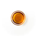 volume complex in a glass dish. It is a brown-ish colored liquid.
